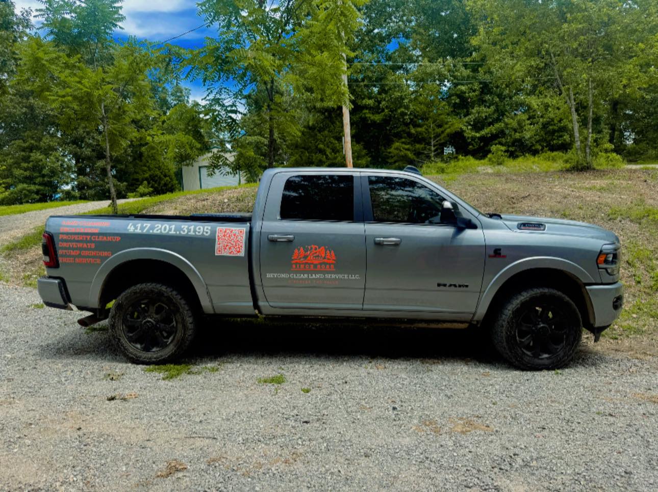 Beyond Clear Land Service branded truck